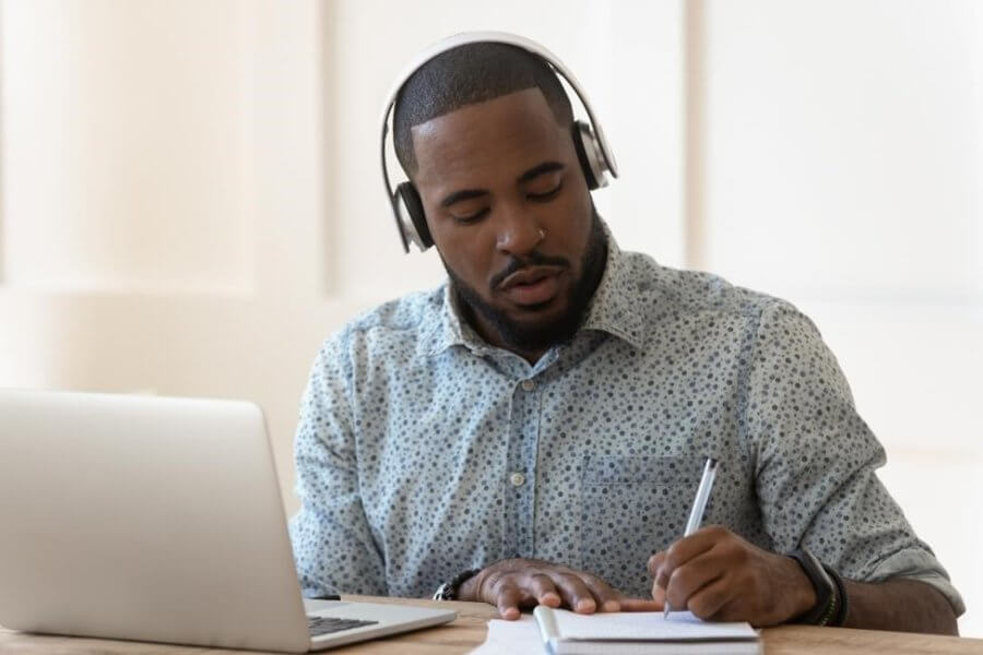 Man studying for his California guard card