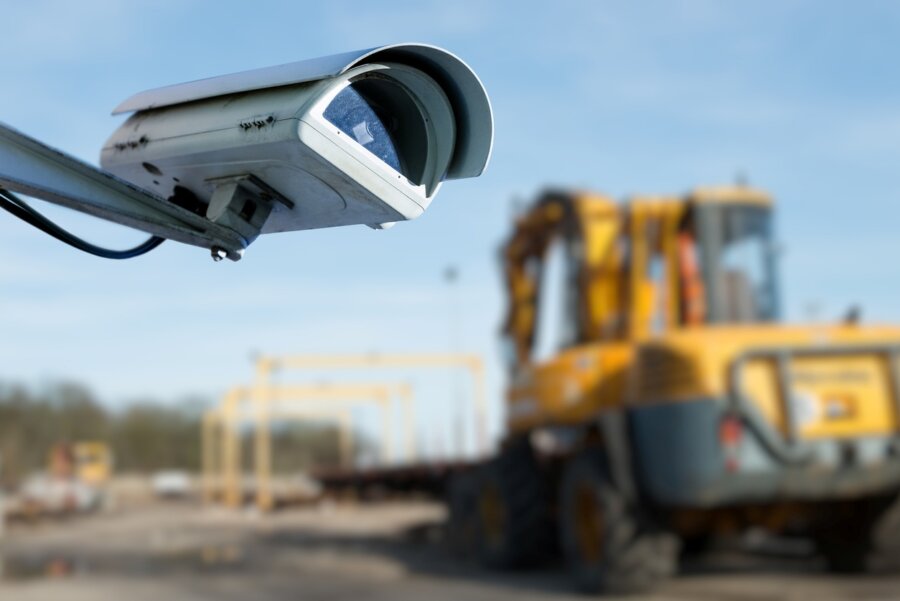 A security camera on a mobile security trailer at a job site.